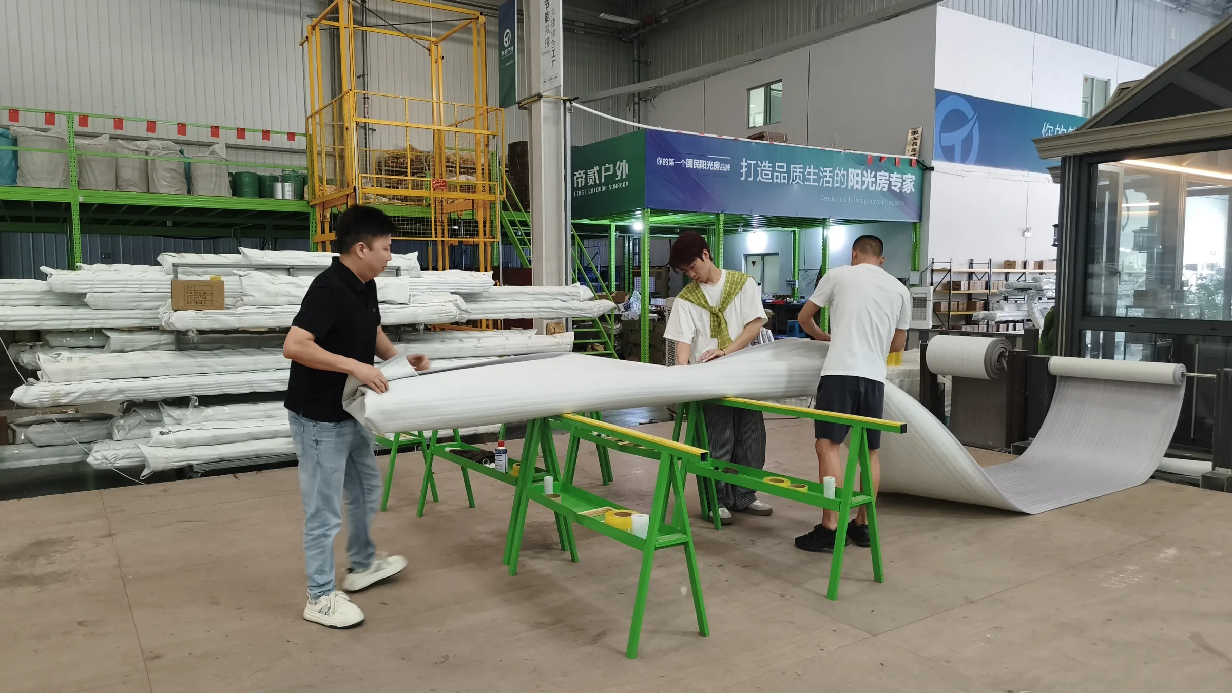 Factory team protecting aluminum components before packing