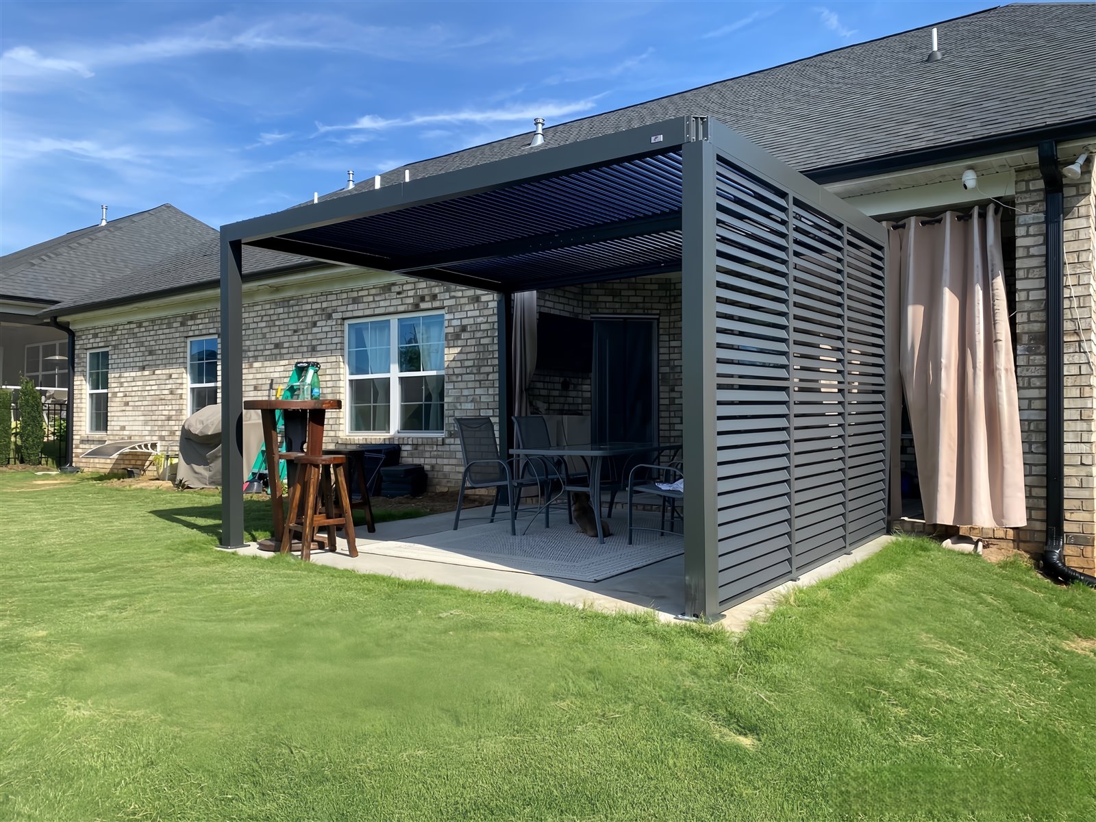 Long wall-adjacent louvered pergola suitable for a 3 by 5 or 3 by 6 metre layout