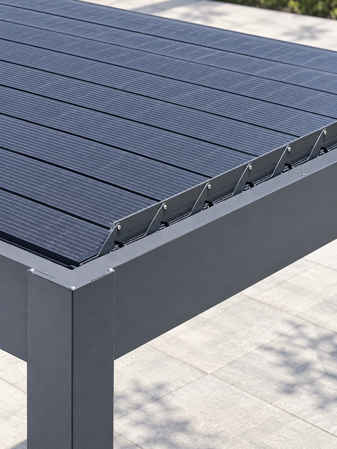 Close-up of solar louver blades with photovoltaic strips fitted to the moving roof panels